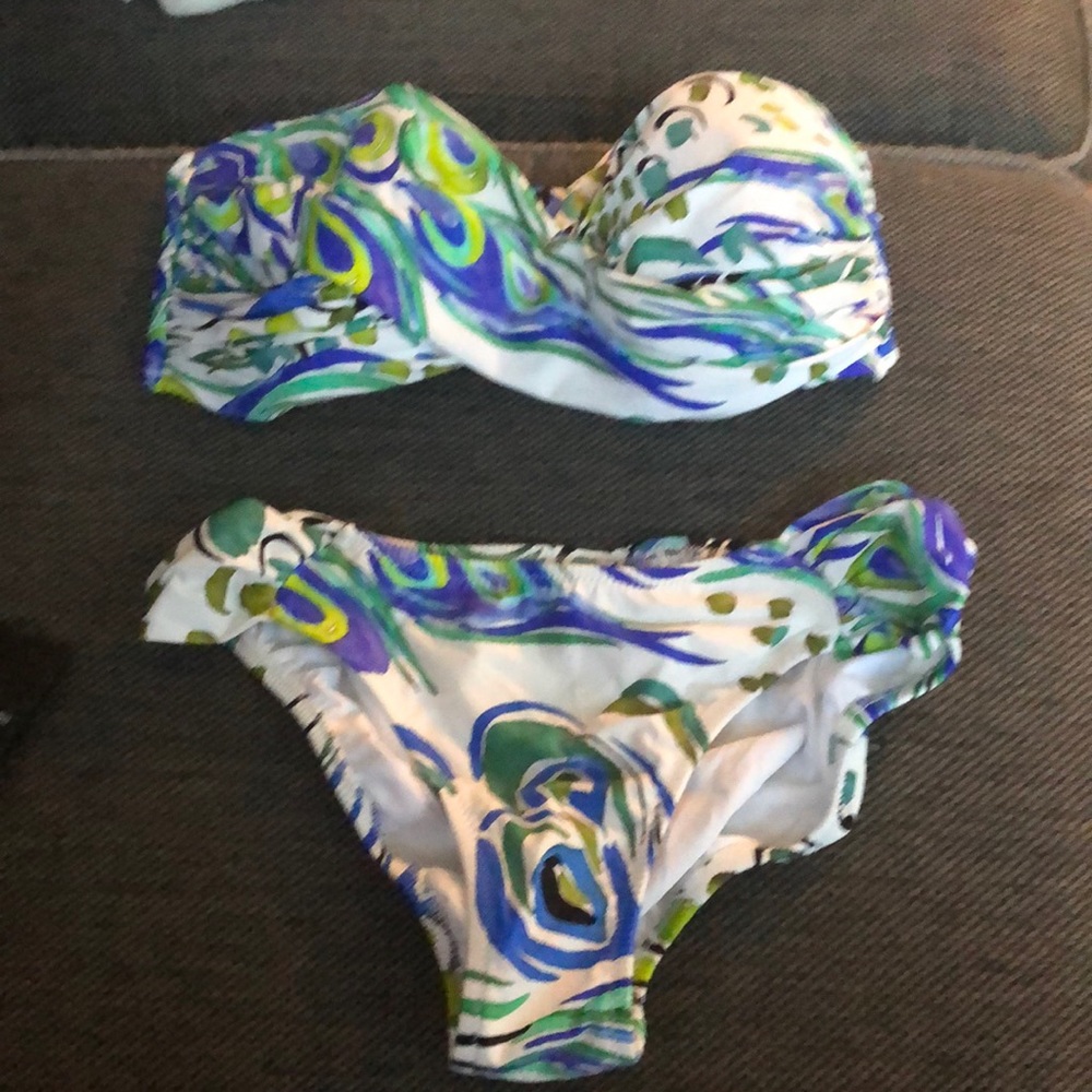 Like new worn one time Tara grinna bandeau bikini. Missing strap